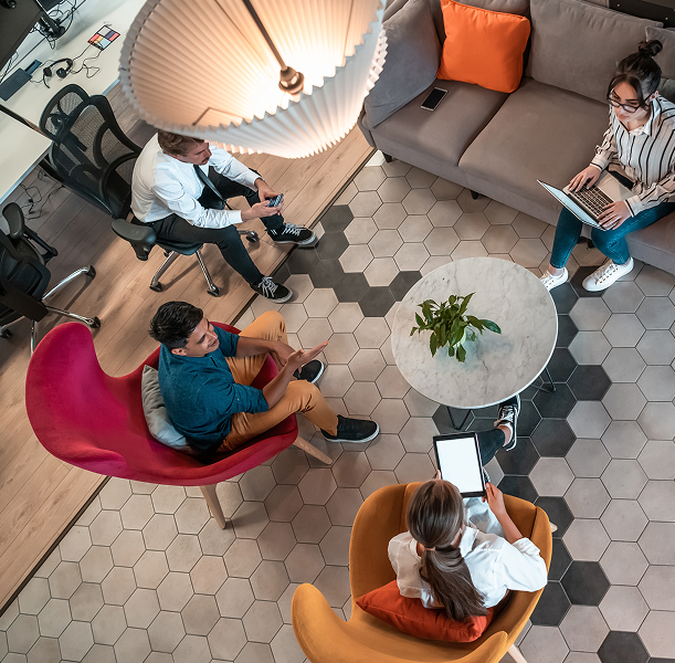 Modern office workspace with collaborative team members